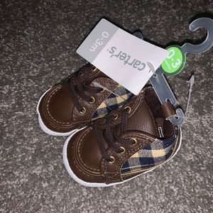 New with tags - Carter’s shoes 0-3
